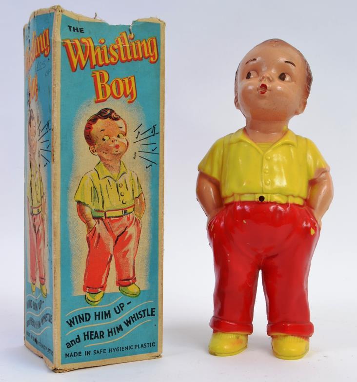 whistling boy figurine